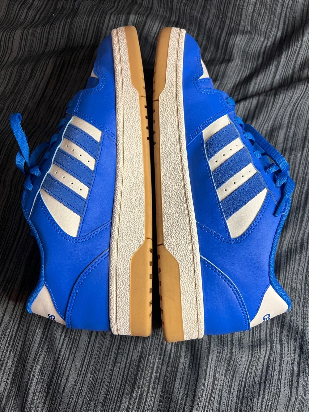 Adidas Break Start sneakers.